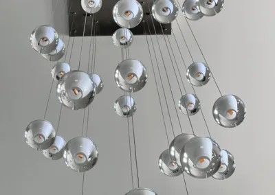 A chandelier with a lot of glass balls hanging from it.